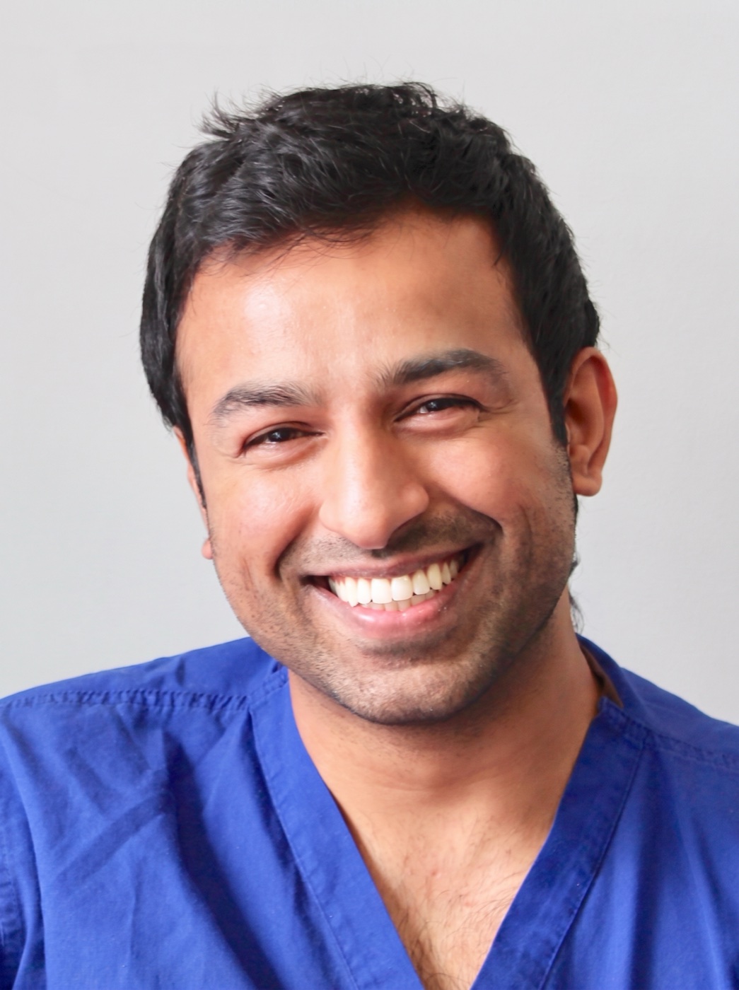 Dr Khurrum Hussain, specialist periodontist and implant surgeon